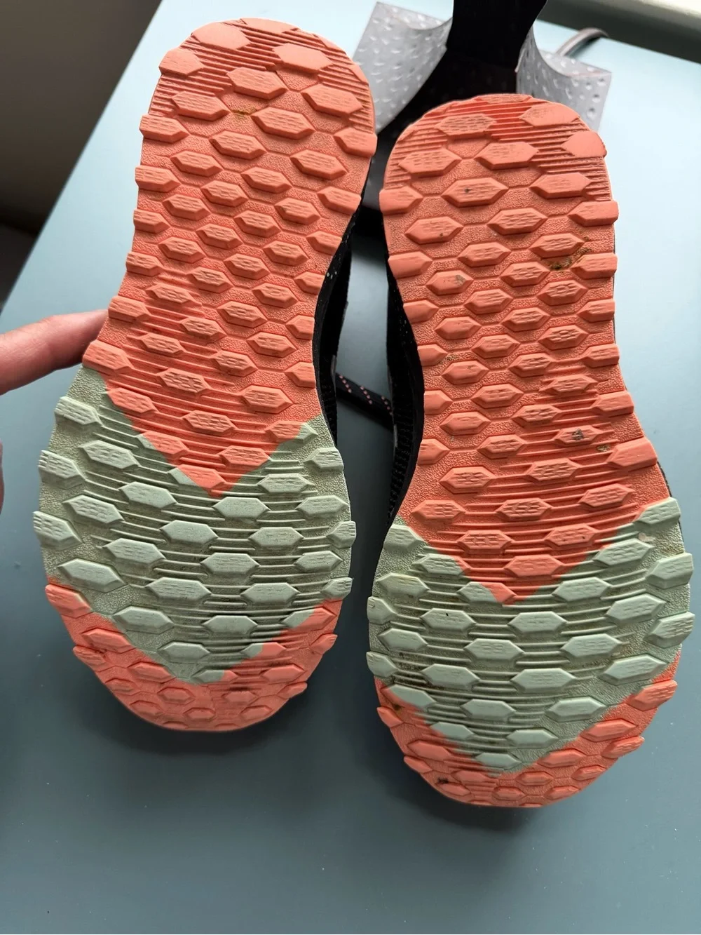 New Balance Kids Black Sneakers with orange/teal Accent